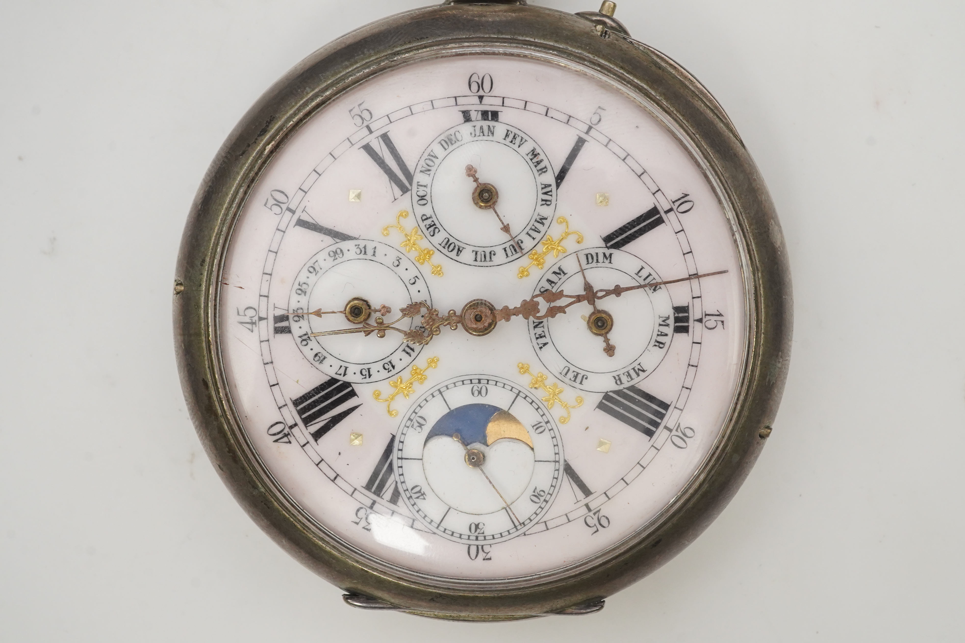 A large early 20th century German 800 standard silver open faced calendar moon phase keyless pocket watch